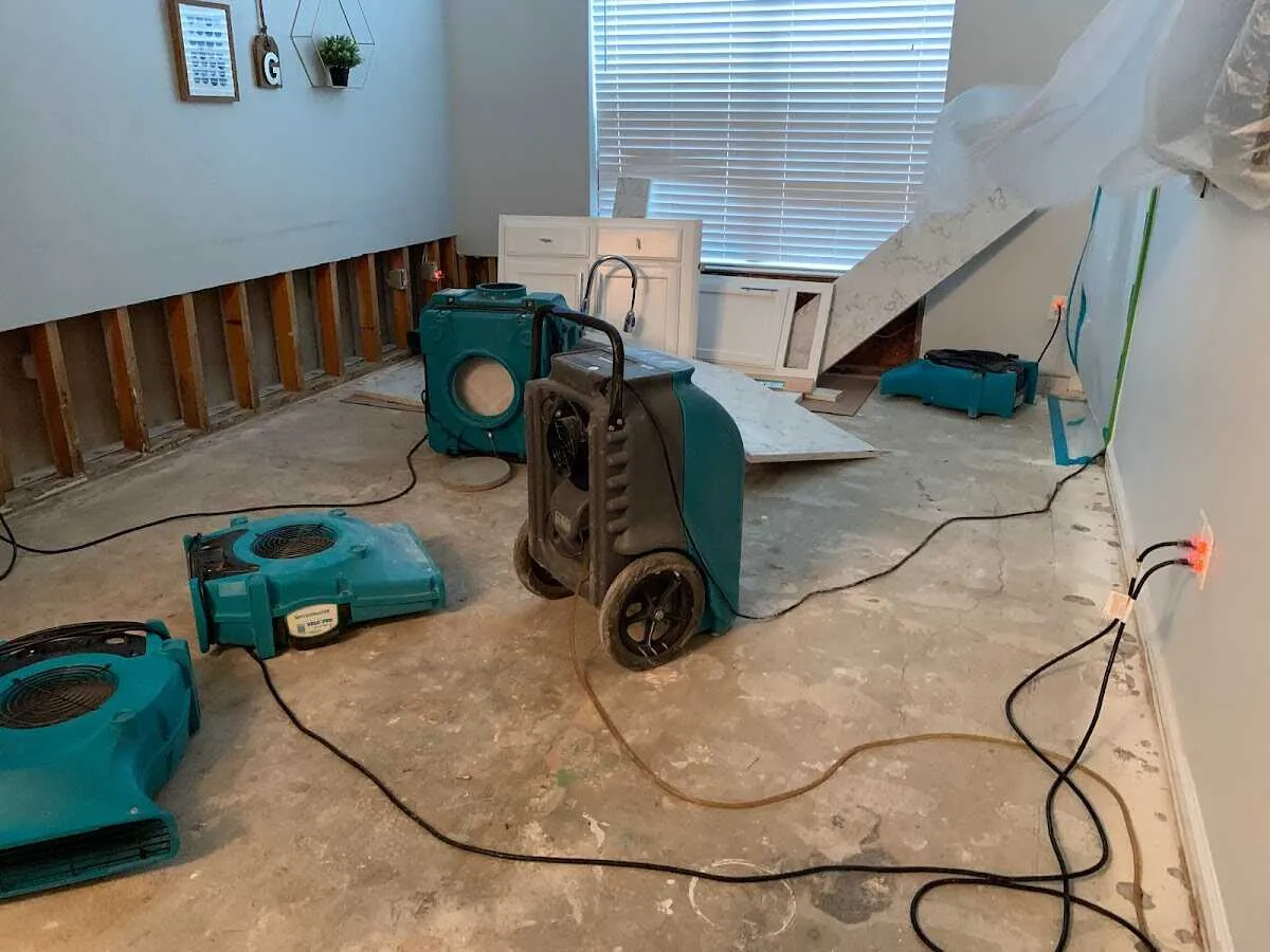 Dehumidifier in flood-cut room for Water Damage Restoration in Napoleon